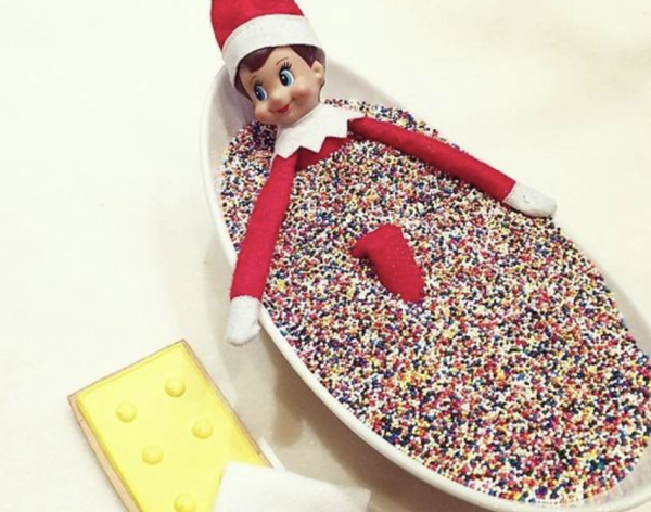 Shown is an example of an elf on the shelf in a bathtub of sprinkles, just some of the fun ways that parents partake in the tradition. 